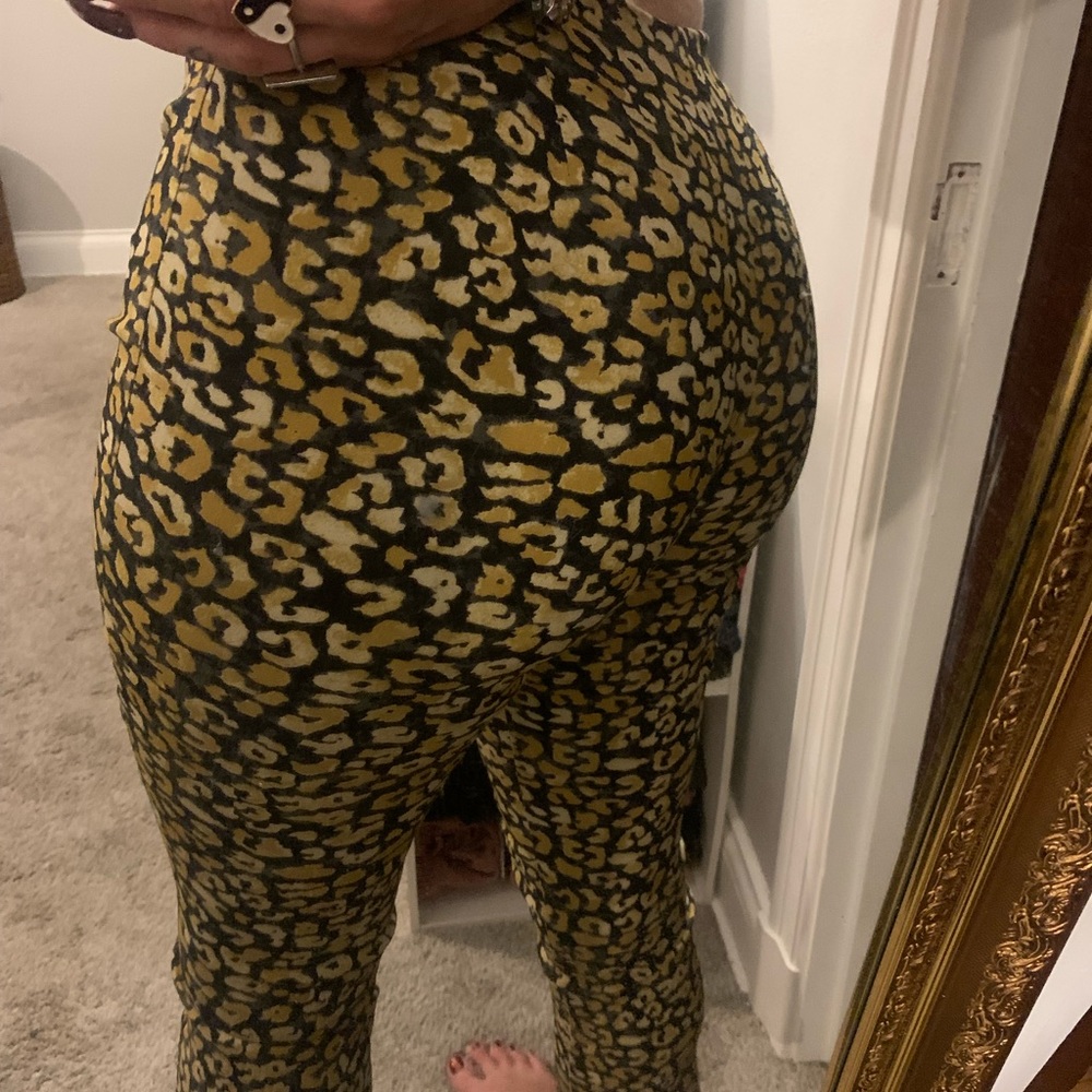 Gold & Black Cheetah Print Flare Capri’s— 74% Rayon. 23% Nylon. 3% Spandex.